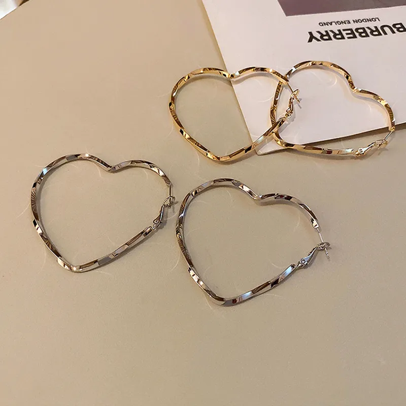 Exaggerated Heart Shape Plating Hollow Out Alloy Hoop Earrings