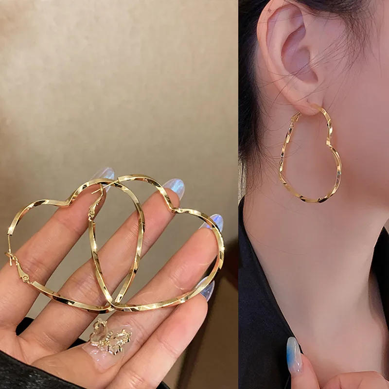 Exaggerated Heart Shape Plating Hollow Out Alloy Hoop Earrings