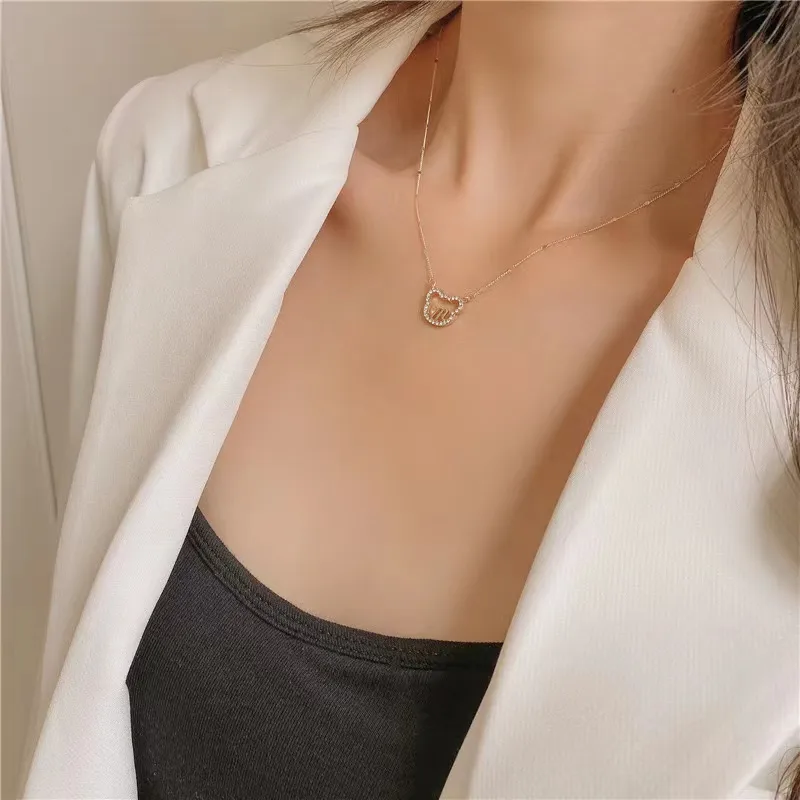 simple letter M in a little bear necklace