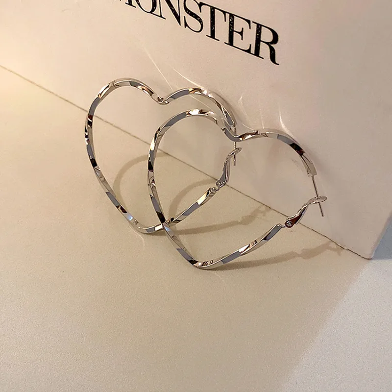 Exaggerated Heart Shape Plating Hollow Out Alloy Hoop Earrings